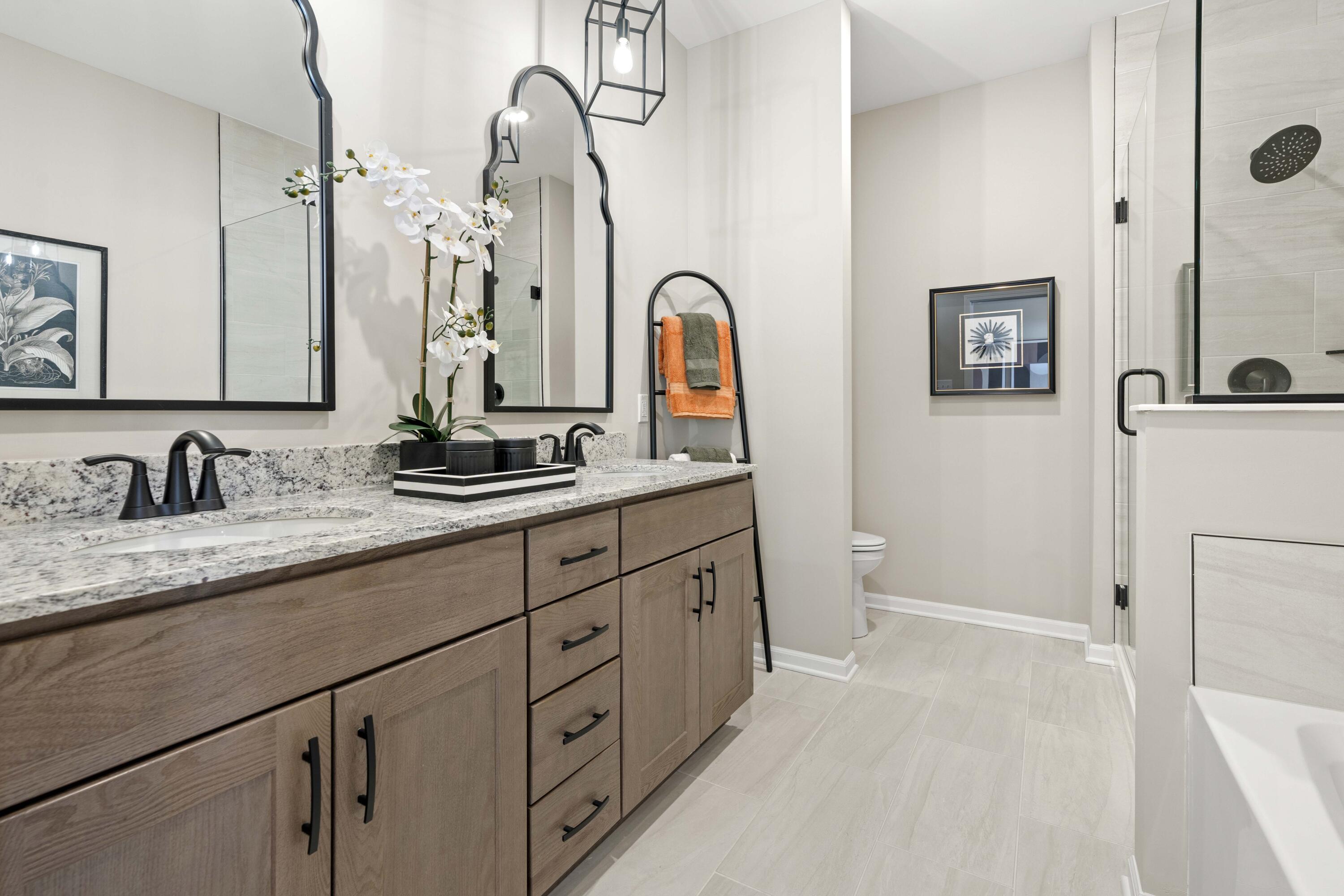 10362 Knox Street Crown Point, IN 46307 - Photo 13 of 14 a bathroom with a sink and a mirror