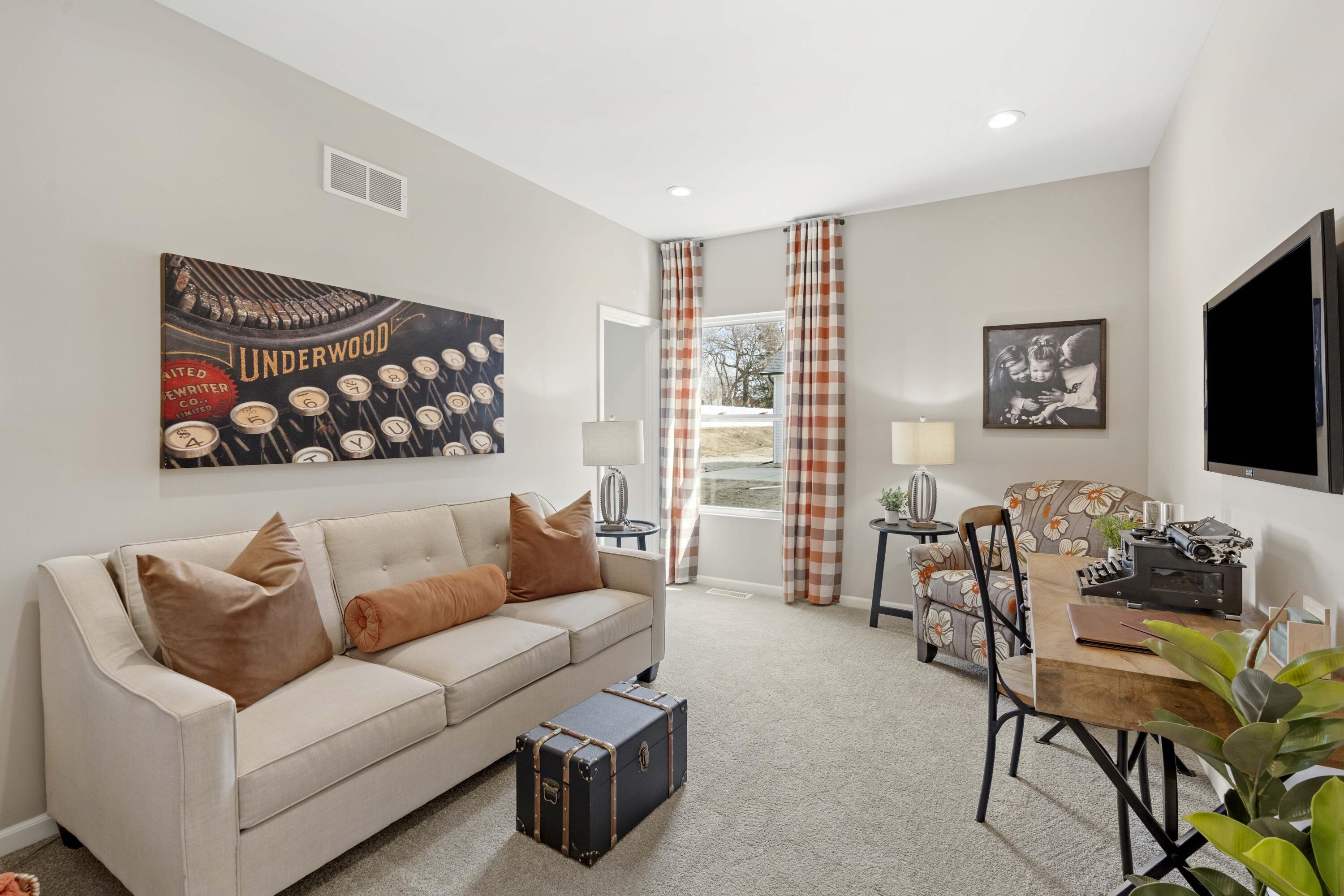 10362 Knox Street Crown Point, IN 46307 - Photo 9 of 14 a living room with furniture and a flat screen tv