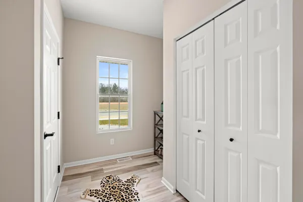 a view of an empty room with window