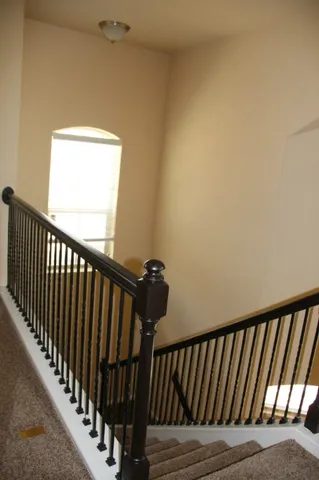 a view of balcony with wooden floor