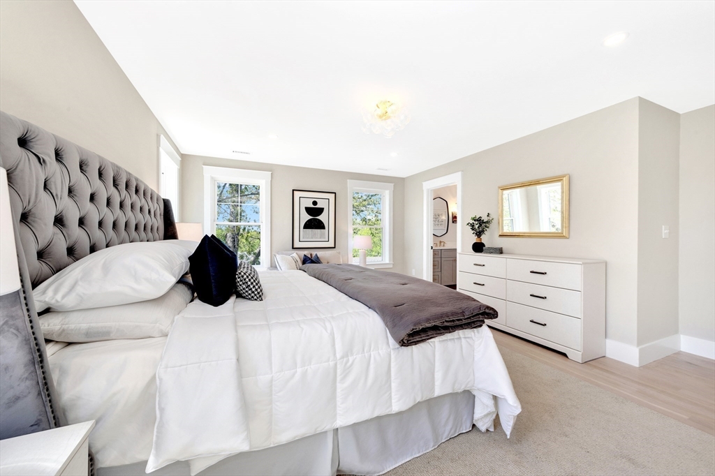354 Ridge Street Arlington, MA 02474 - Photo 25 of 42 a bedroom with a bed and a couch