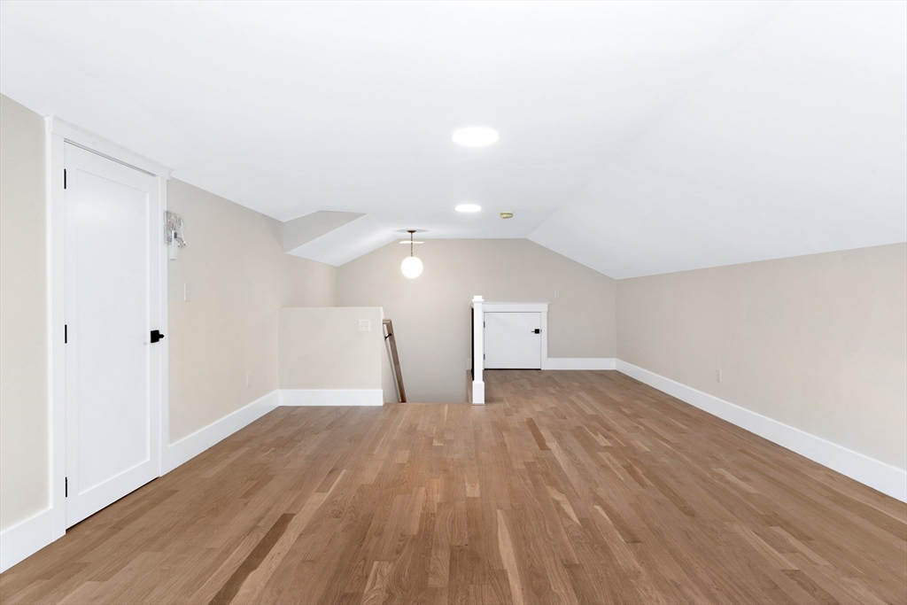 354 Ridge Street Arlington, MA 02474 - Photo 33 of 42 a view of empty room with wooden floor