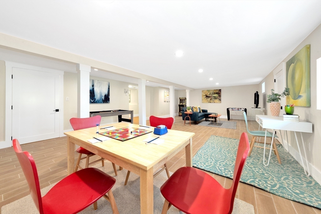 354 Ridge Street Arlington, MA 02474 - Photo 36 of 42 a view of a dining room with furniture and a table