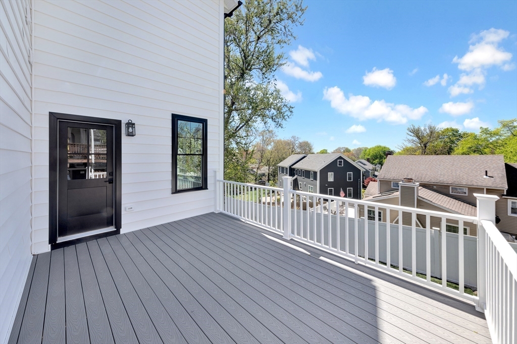 354 Ridge Street Arlington, MA 02474 - Photo 39 of 42 a view of deck and wooden floor