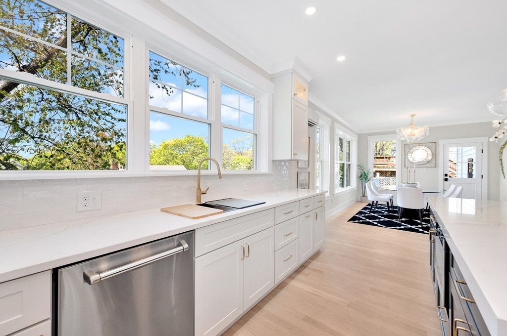 354 Ridge Street Arlington, MA 02474 - Photo 4 of 42 a kitchen with a sink stove and window