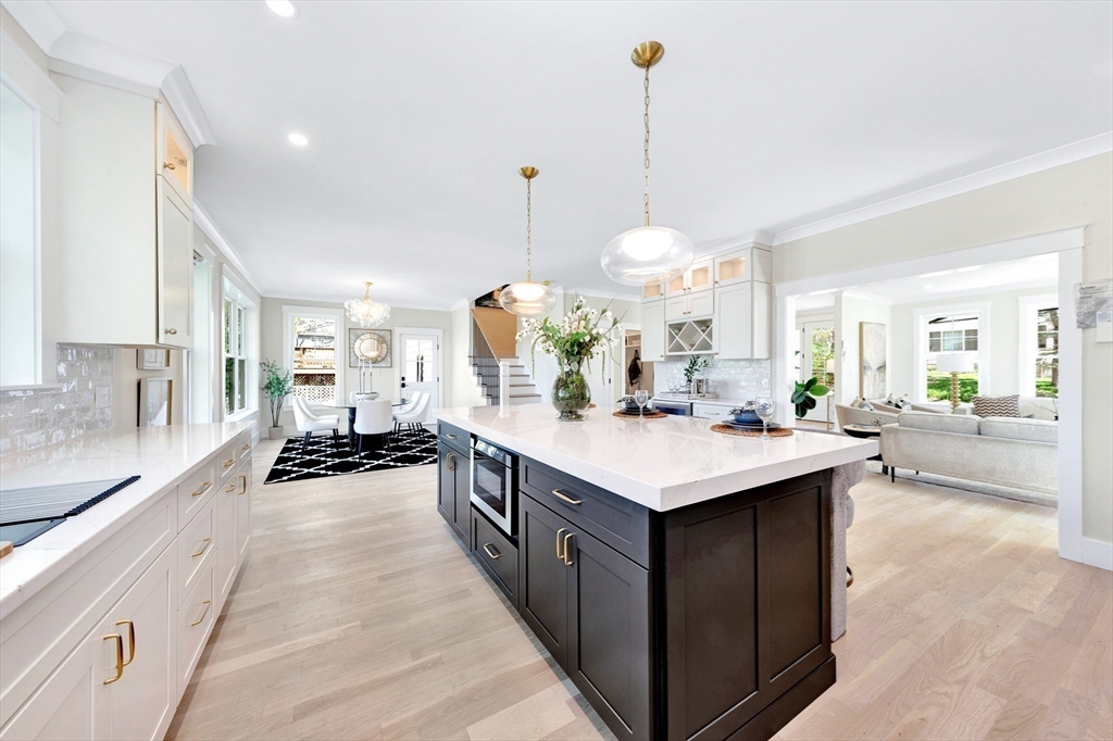 354 Ridge Street Arlington, MA 02474 - Photo 5 of 42 a large kitchen with kitchen island a large island in it