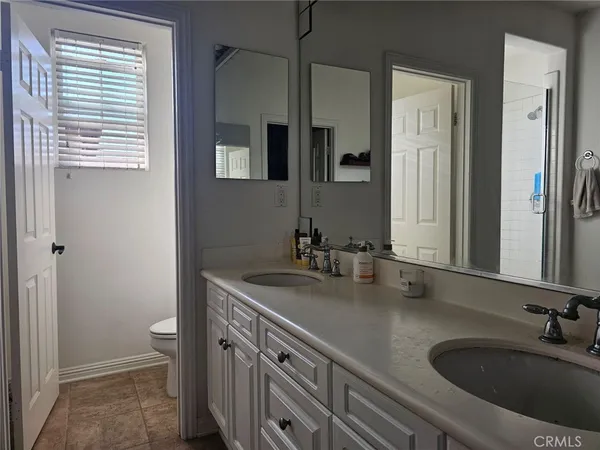 a bathroom with a sink and a toilet