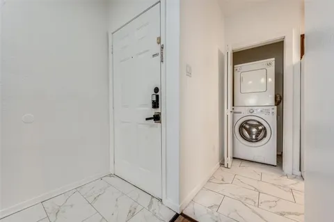 a view of a storage & utility room with a sink