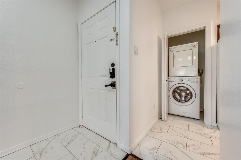5550 Spring Valley Road, Unit E22 Dallas, TX 75254 - Photo 4 of 14 a view of a storage & utility room with a sink