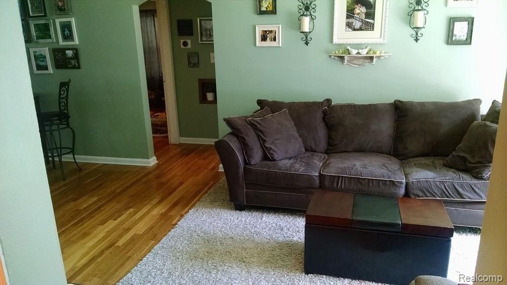 15714 Champaign Road Allen Park, MI 48101 - Photo 13 of 24 LIVING ROOM VIEWED FROM FRONT ENTRY FOYER.