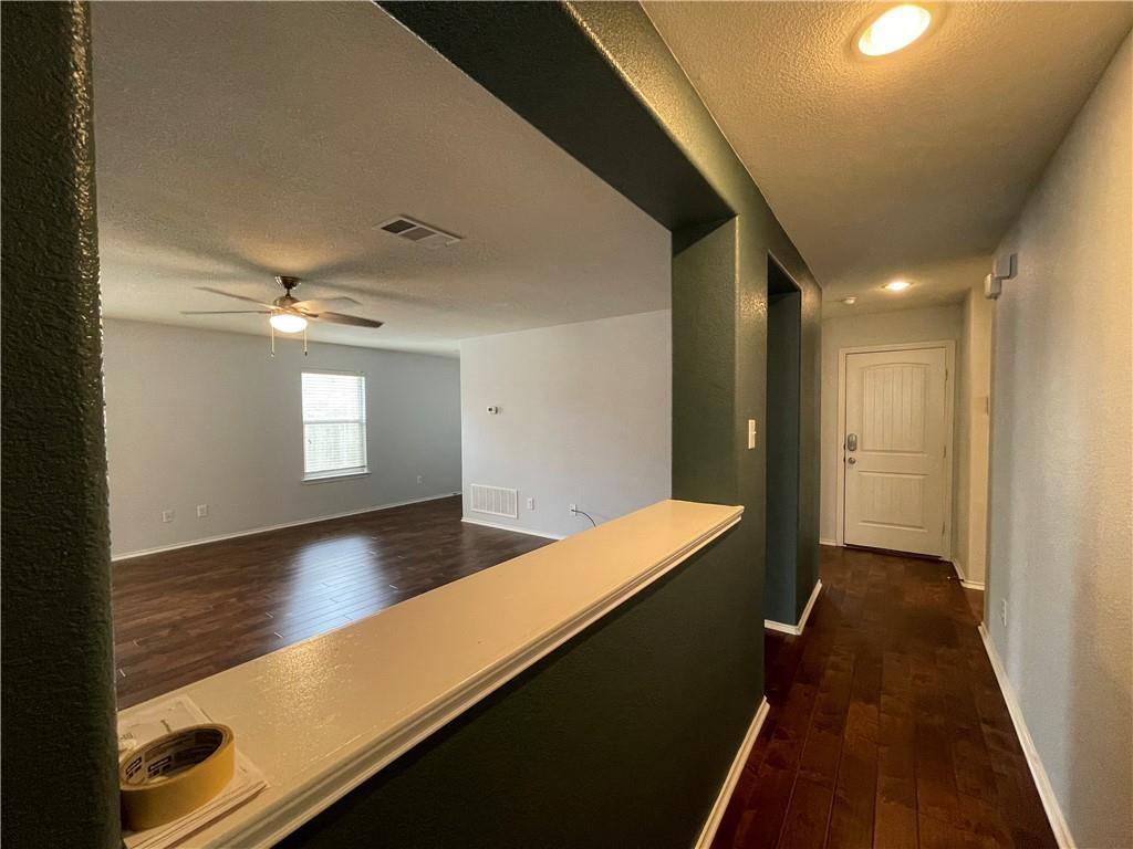 2114 Zephyr Lane Round Rock, TX 78664 - Photo 14 of 27 a view of gallery with wooden floor