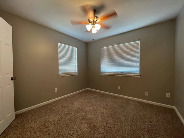 an empty room that has a window