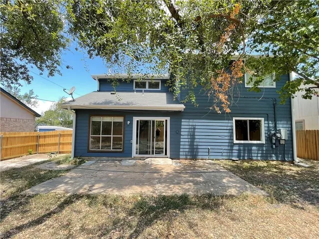a view of a house with a patio