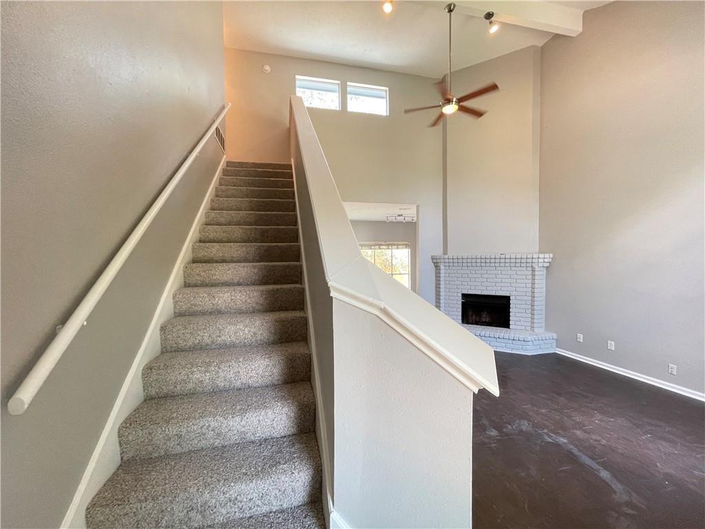 2114 Zephyr Lane Round Rock, TX 78664 - Photo 3 of 27 a view of entryway and hall with wooden floor