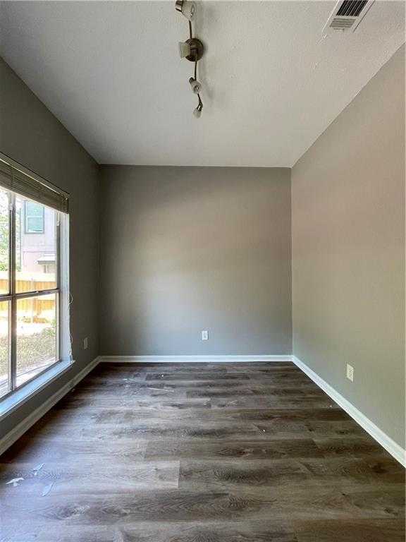 2114 Zephyr Lane Round Rock, TX 78664 - Photo 7 of 27 a view of an empty room with a window