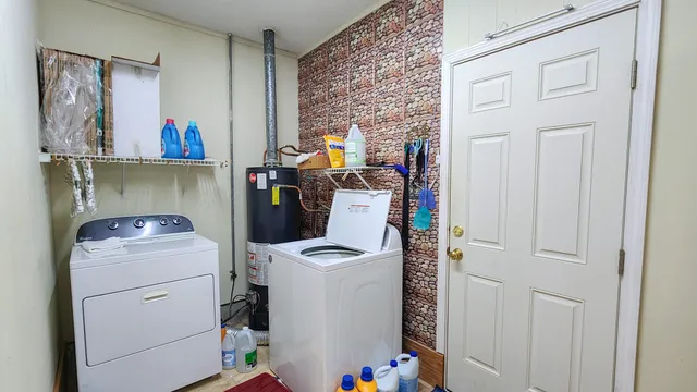 a storage room with washer and dryer