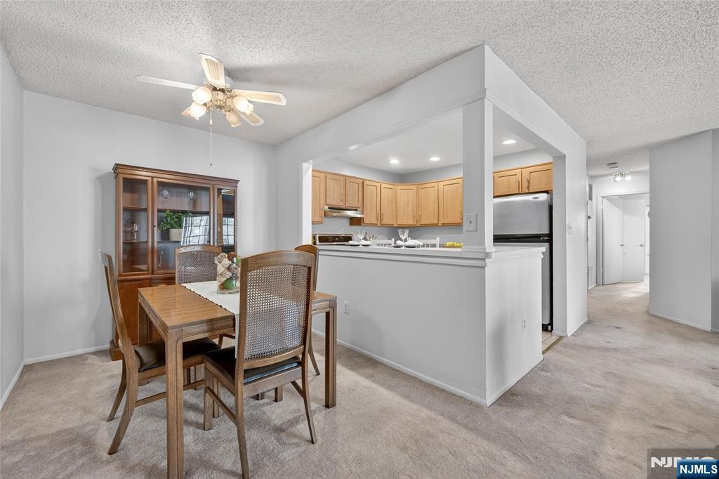 560 Holly Court Mahwah, NJ 07430 - Photo 4 of 33 a dining room with furniture and window