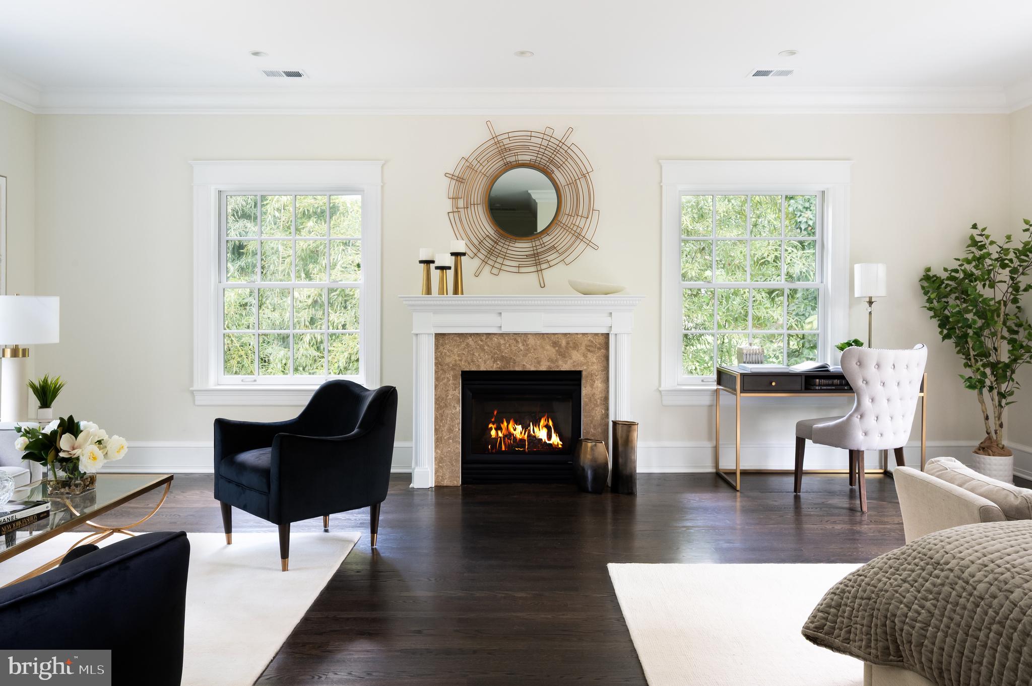2913 University Terrace Northwest Washington, DC 20016 - Photo 31 of 46 a living room with furniture a window and a fireplace