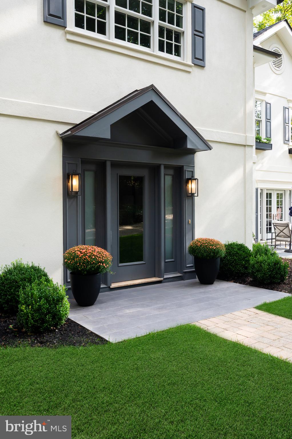 2913 University Terrace Northwest Washington, DC 20016 - Photo 5 of 46 a view of house with backyard outdoor seating and green space