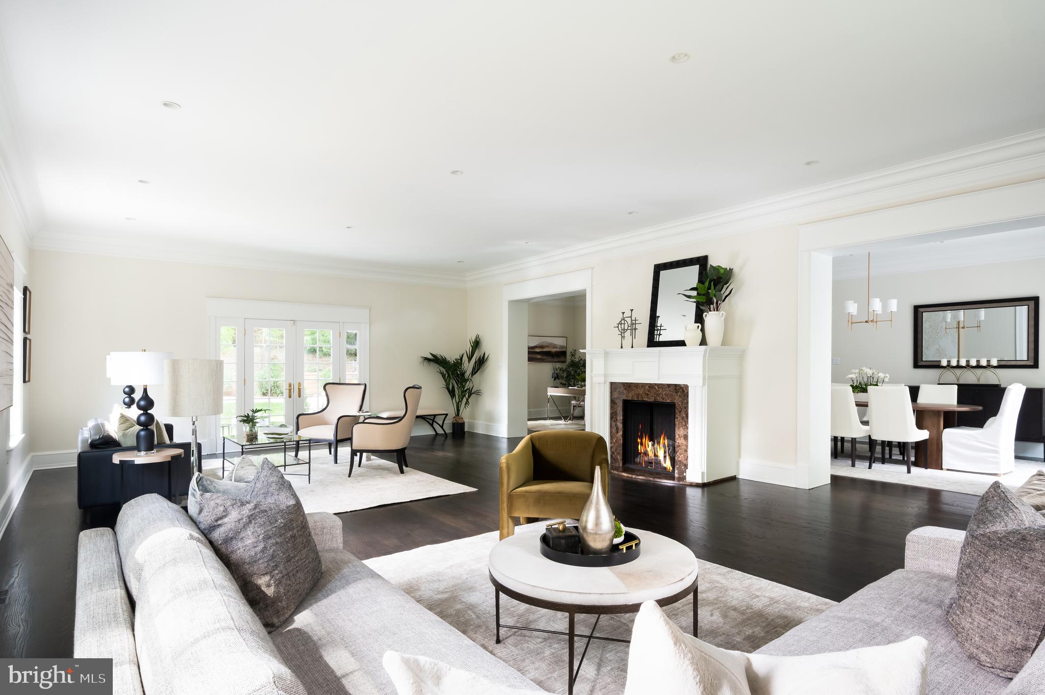2913 University Terrace Northwest Washington, DC 20016 - Photo 6 of 46 a living room with furniture fireplace and a table