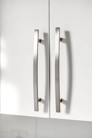 a bed room with a bed and a chair