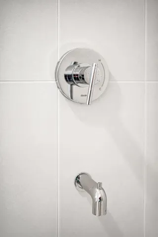 a bathroom with a toilet and a sink