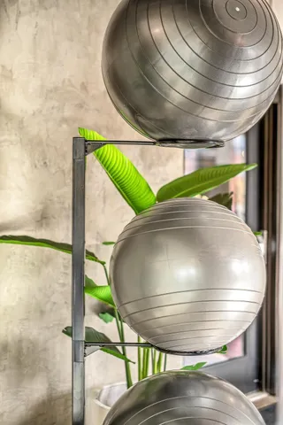 a bathroom with a shower and a sink