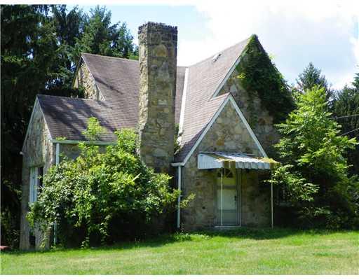 772 Highway 31 Ruffs Dale, PA 15679 - Photo 1 of 18 Exterior Front. Imagine living in this beautifully hand-crafted stone home on over 12 wooded acres.