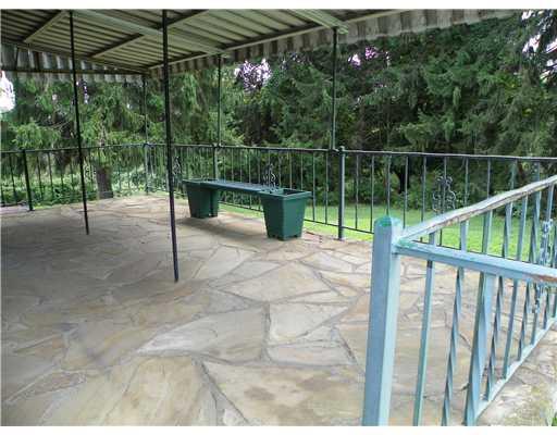 772 Highway 31 Ruffs Dale, PA 15679 - Photo 13 of 18 Patio/Deck. Relax and enjoy the covered rear patio, overlooking over 12 wooded acres.