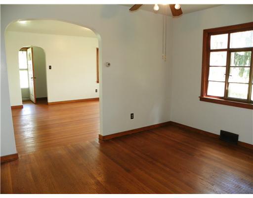 772 Highway 31 Ruffs Dale, PA 15679 - Photo 4 of 18 Dining Room. The living room flows into the dining room, that features the same large windows and hardwood flooring.