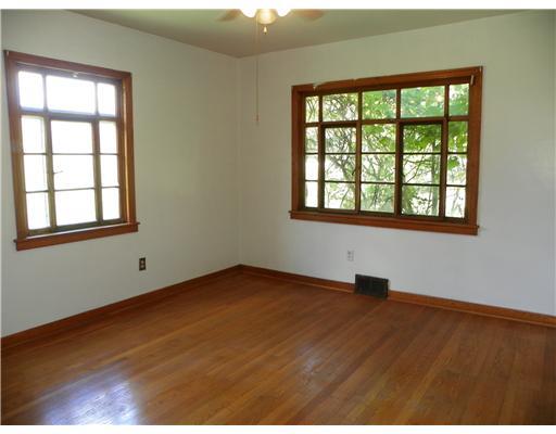 772 Highway 31 Ruffs Dale, PA 15679 - Photo 8 of 18 Master Bedroom. The master bedroom is located on the main floor and features large windows on two walls that allow lots of natural light to filter in.