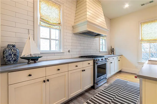 a bedroom with a bed and a flat tv screen