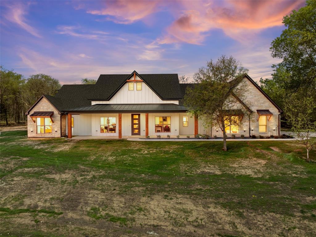 317 North Big Red Way China Spring, TX 76633 - Photo 1 of 40 a front view of a house with a yard