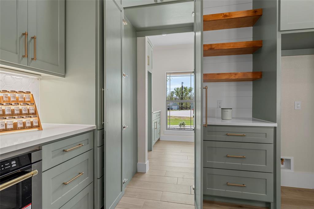 317 North Big Red Way China Spring, TX 76633 - Photo 13 of 40 a view of kitchen and front door