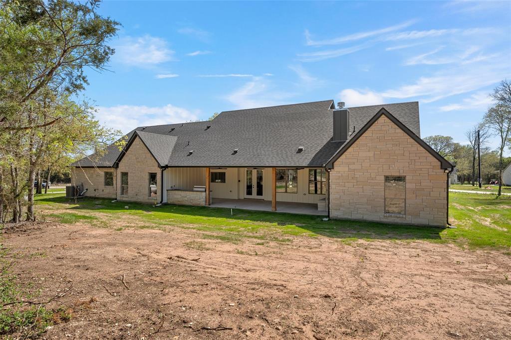 317 North Big Red Way China Spring, TX 76633 - Photo 31 of 40 a house view with a garden space