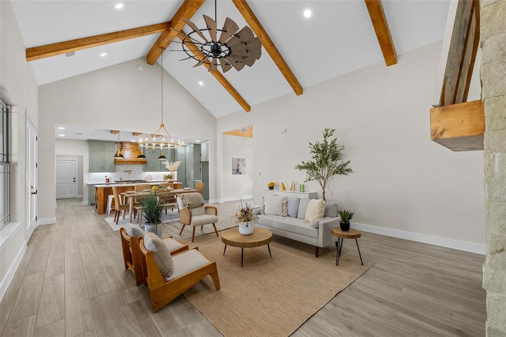 317 North Big Red Way China Spring, TX 76633 - Photo 5 of 40 a living room with furniture and a potted plant