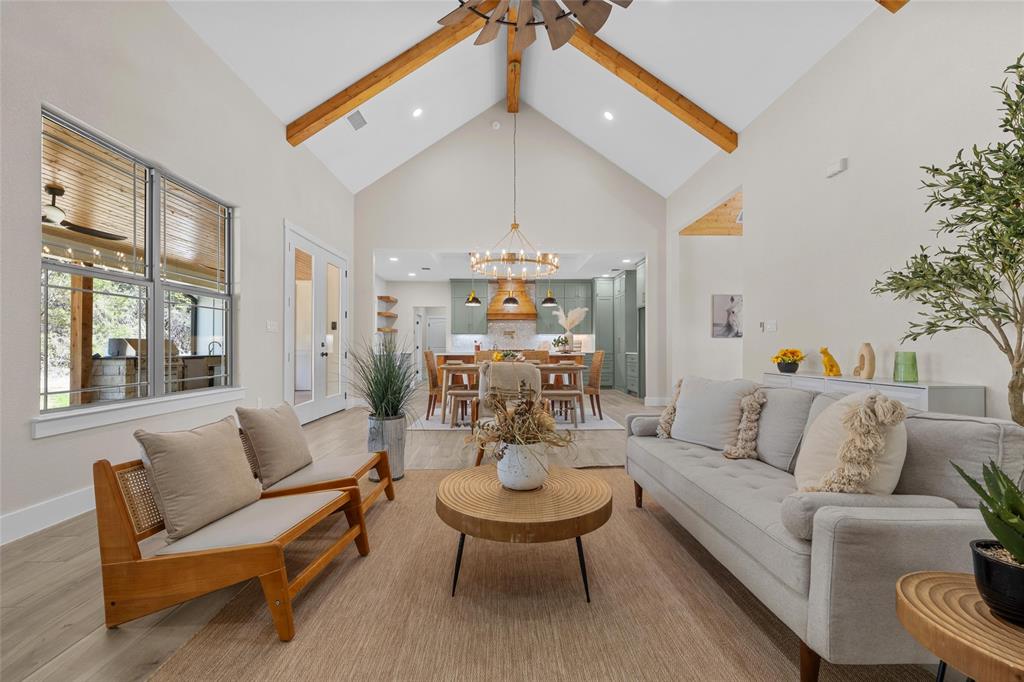 317 North Big Red Way China Spring, TX 76633 - Photo 6 of 40 a living room with furniture and a chandelier