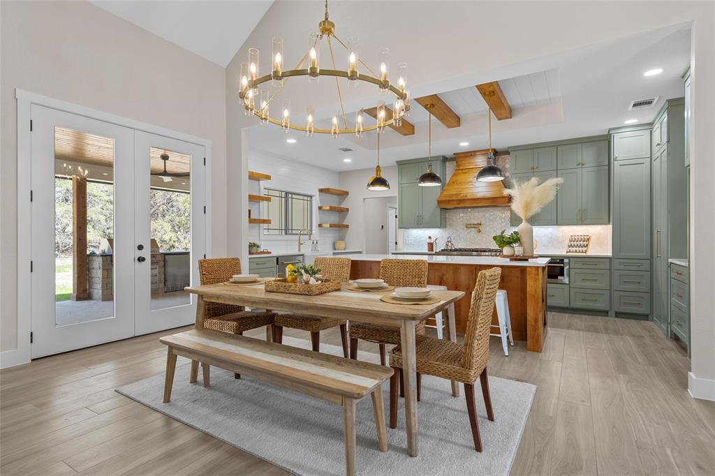 317 North Big Red Way China Spring, TX 76633 - Photo 7 of 40 a view of a dining room with furniture and wooden floor