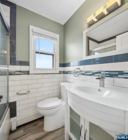 a bathroom with a sink and a toilet