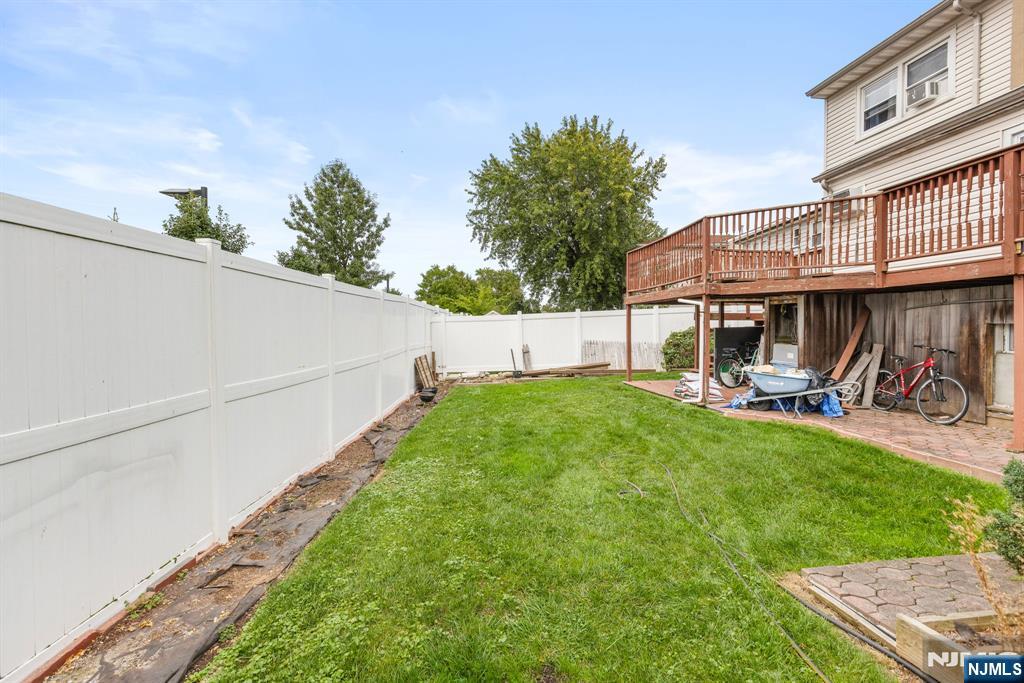 665 9th Street, Unit B Secaucus, NJ 07094 - Photo 15 of 17 a view of a house with backyard and sitting area