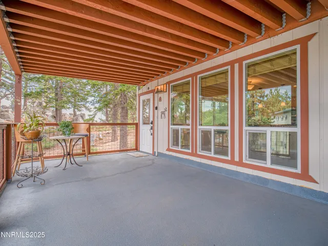 a view of an empty room with a balcony