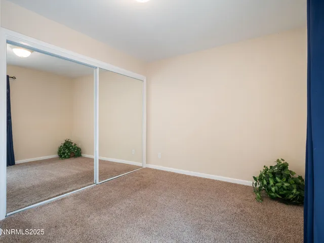 a view of a room with a large window
