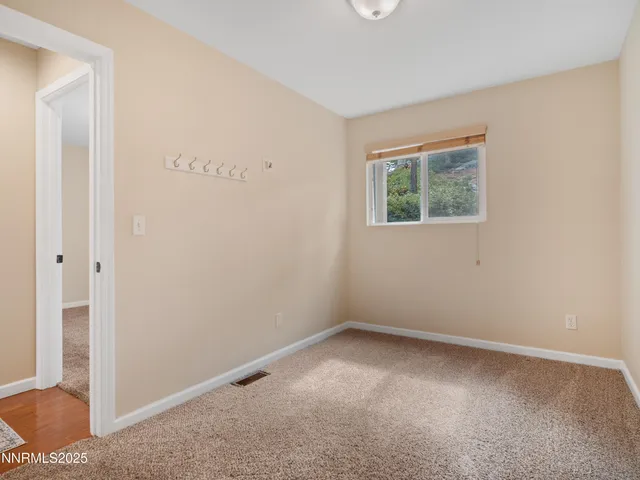 a view of a backyard with trees