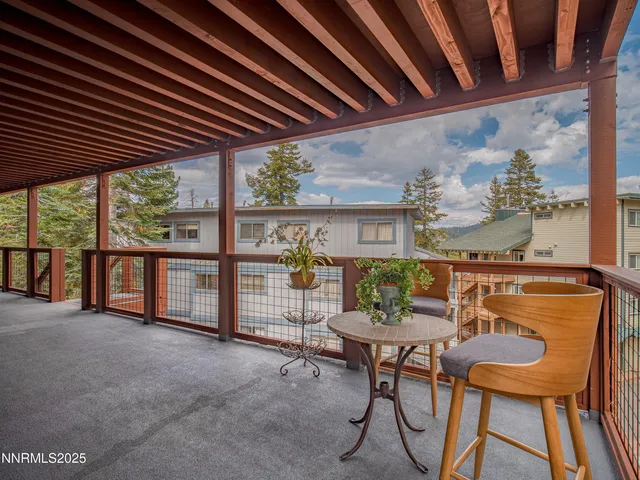 a view of an outdoor space with furniture