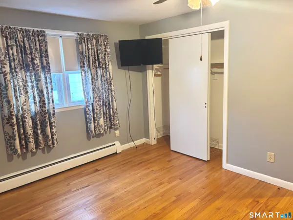 a view of livingroom with hardwood floor and window