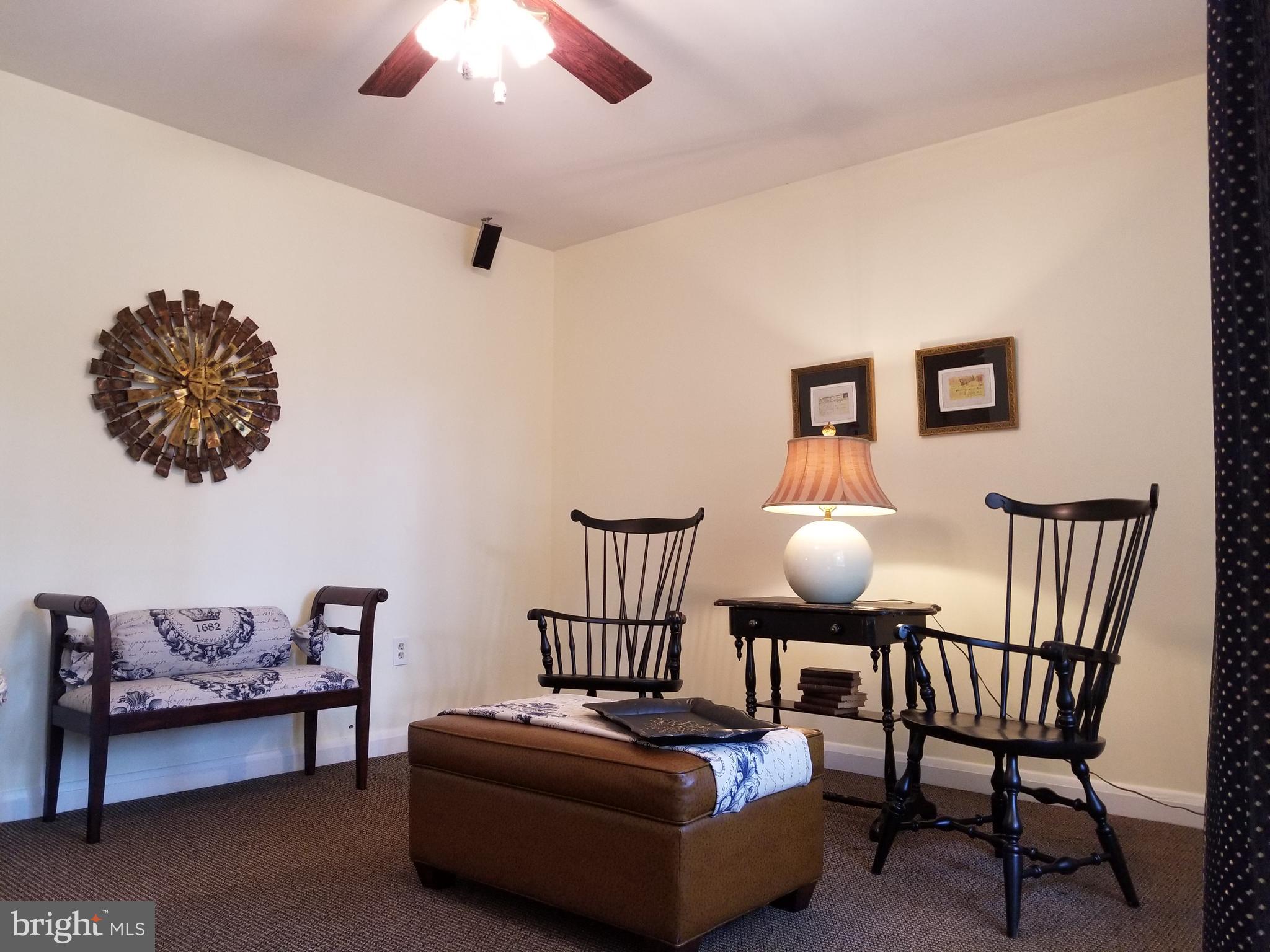 610 Riverside Drive Pasadena, MD 21122 - Photo 47 of 75 Living Room with ceiling fan and light