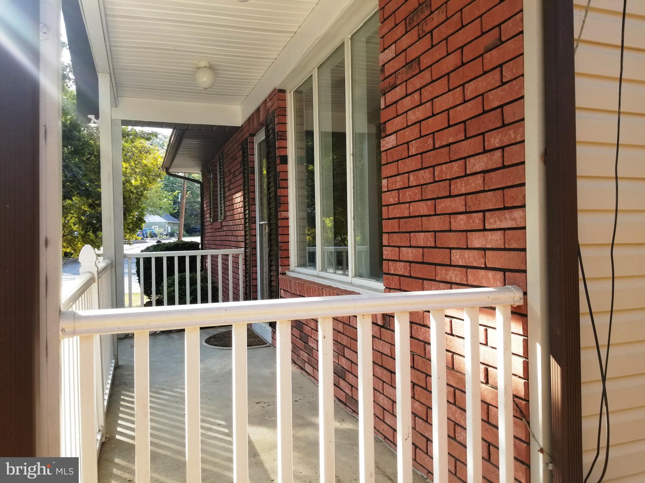 610 Riverside Drive Pasadena, MD 21122 - Photo 56 of 75 Relax on porch & look at your waterfront prop.