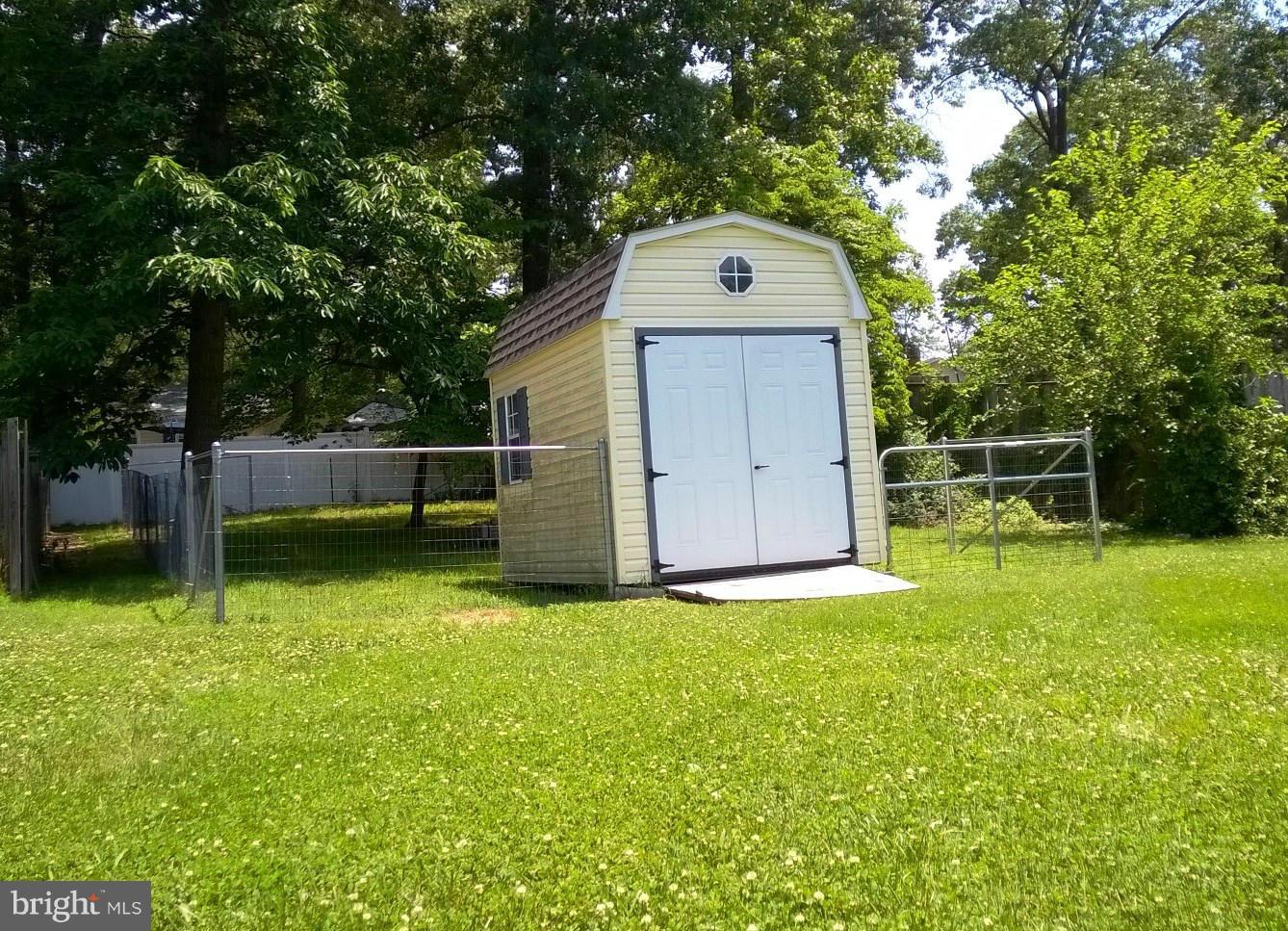 610 Riverside Drive Pasadena, MD 21122 - Photo 70 of 75 Quality barn/shed with stall & fenced in behind.