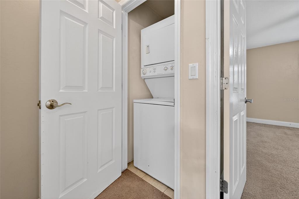 980 Canal View Boulevard, Unit J4 Port Orange, FL 32129 - Photo 16 of 25 a bathroom with a shower