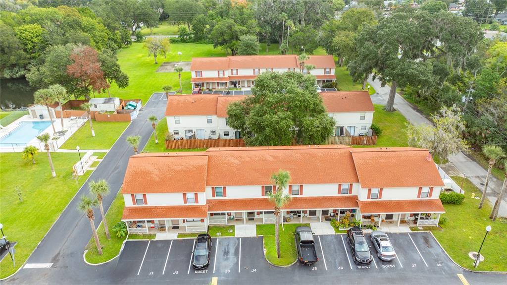 980 Canal View Boulevard, Unit J4 Port Orange, FL 32129 - Photo 22 of 25 an aerial view of a building with garden